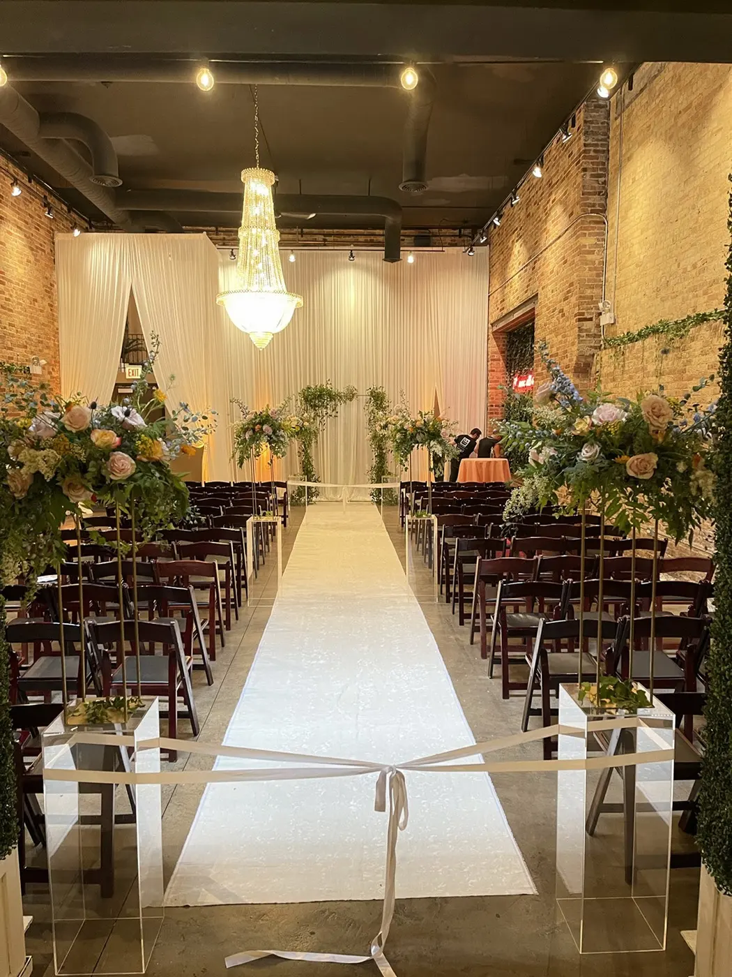 Ceremony floral arch by YJDecorating